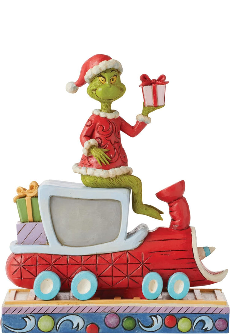 Enesco Jim Shore Dr. Seuss The Grinch on Train Figurine, 8.07 Inch, Multicolor. Very limited and sell fast.