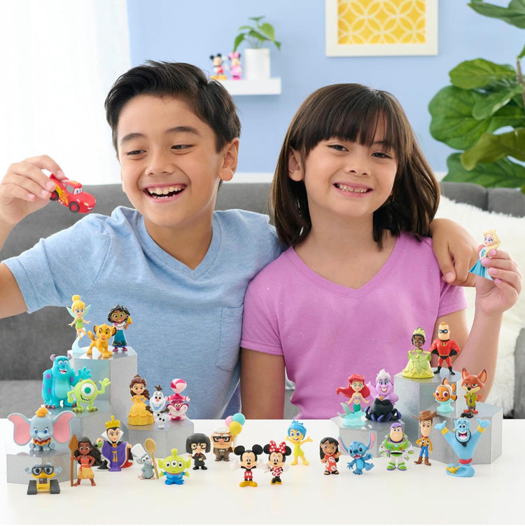 Disney100 Years of Enchantment Celebration Collection Limited Edition 7-piece Figure Pack, Kids Toys for Ages 3 Up by Just Play.