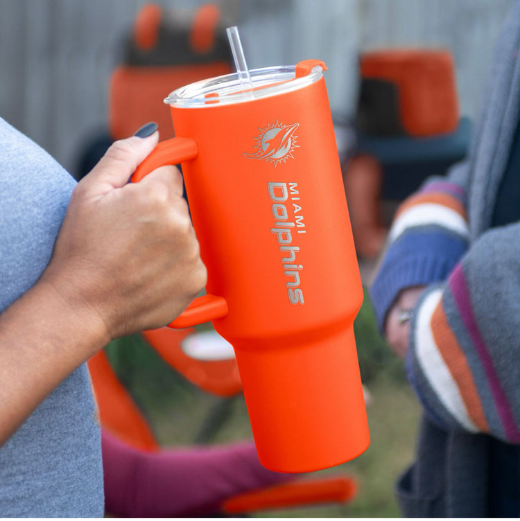 40 OZ Travel Tumbler Set. Official NFL Miami Dolphins. Comes with Straw and is Vacuum insulated.