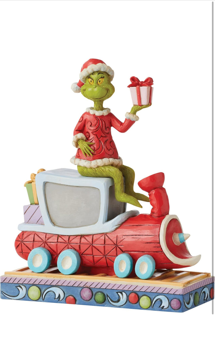 Enesco Jim Shore Dr. Seuss The Grinch on Train Figurine, 8.07 Inch, Multicolor. Very limited and sell fast.