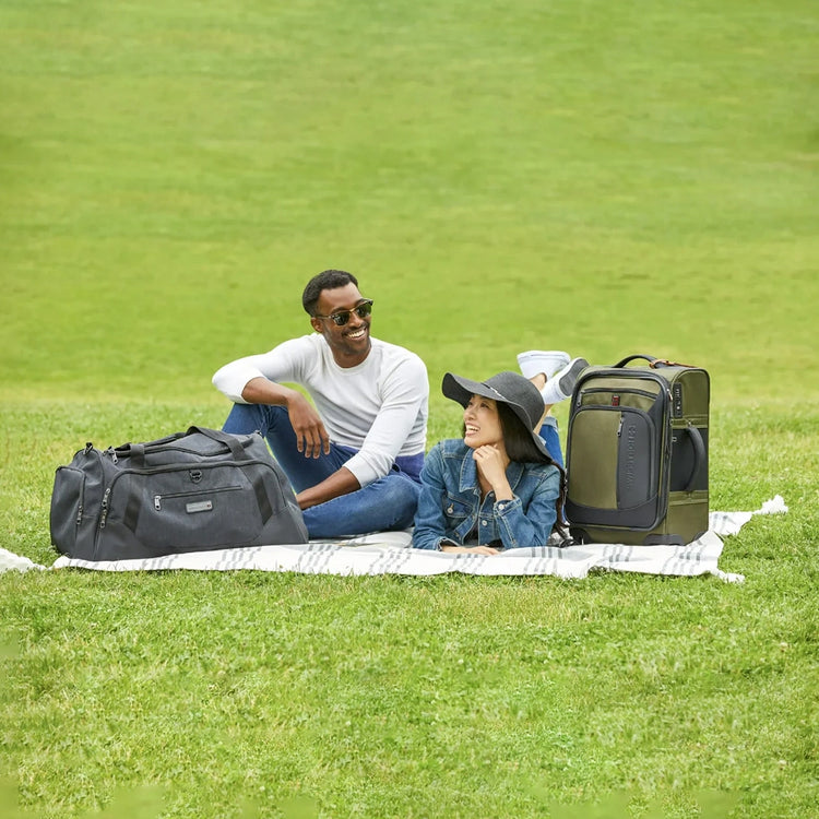 SwissTech Gray Excursion 28" Travel Duffel 13.5Hx28Wx15"D (Walmart Exclusive). Free pair of NFL or NCAA socks with the purchase of this travel duffle. Go to NFL or NCAA categories and put what team you want in the notes field of the order!